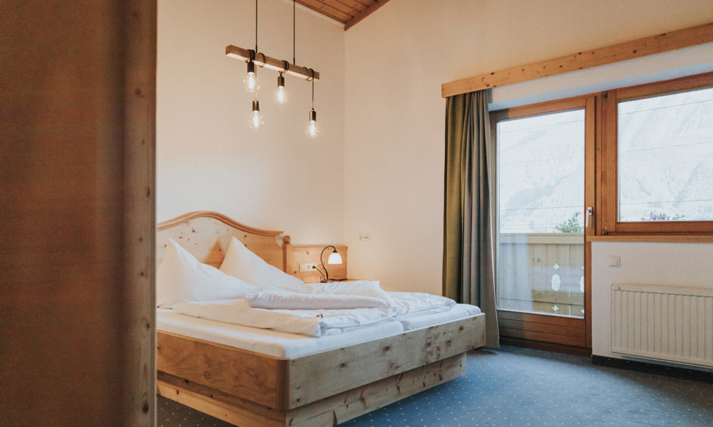Panorama-Doppelzimmer Paarseen Bett